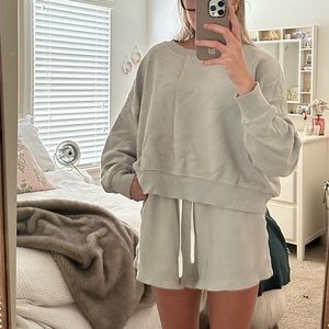 Matching sweat shirt and shorts set. Size small. Soft cotton material.